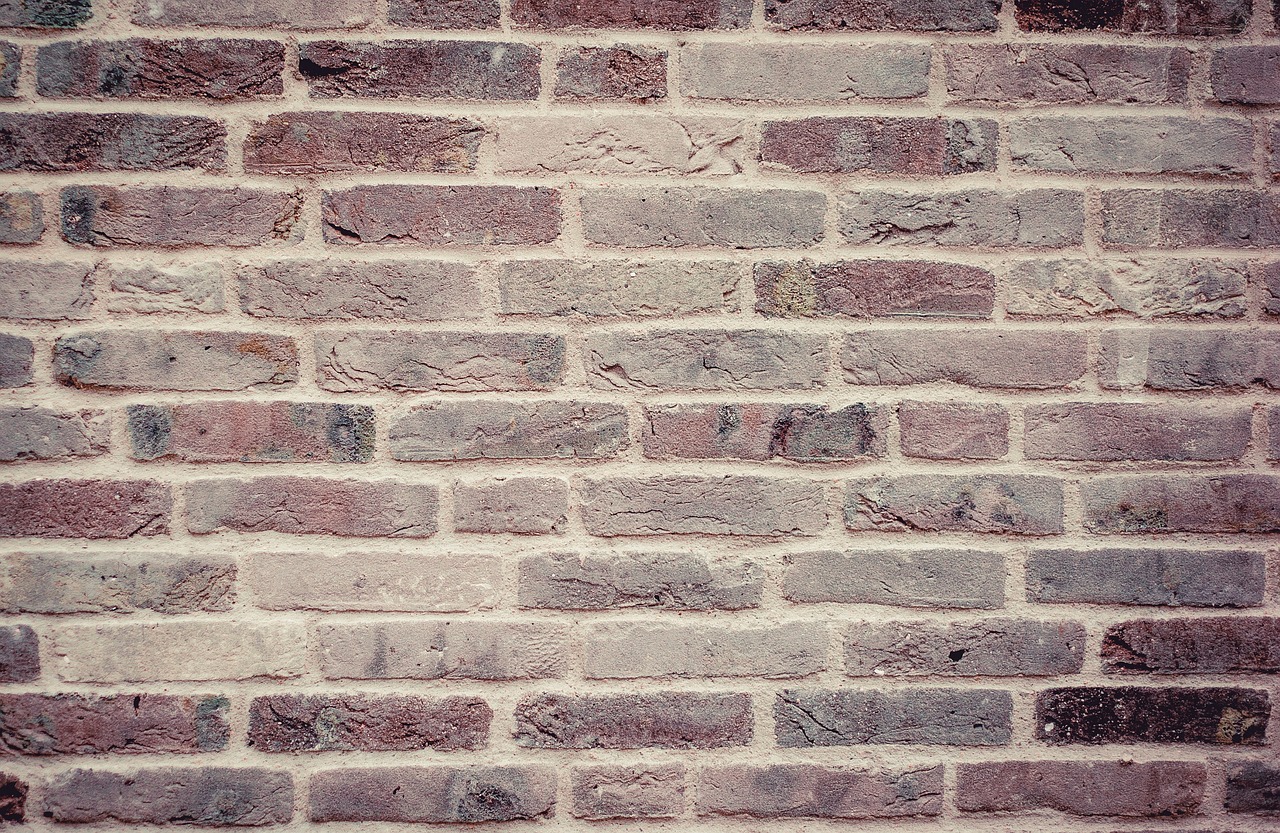 Lime plaster and mortar work on an older wall